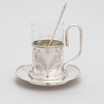 A 4-piece silver tea glass set, Russia 1873-1917.