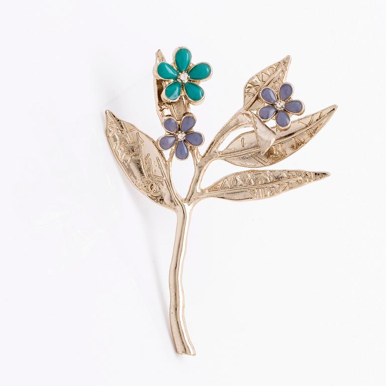 Chanel brooch, metal and resin., approx 8 x 6 cm, original case and box.