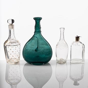 A set of eight glass bottles and decanters, circa 1800/19th Century.