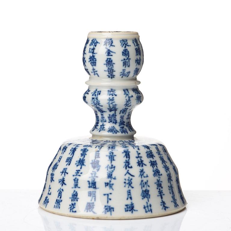 A blue and white candle stick, Qing dynasty, 19th Century.