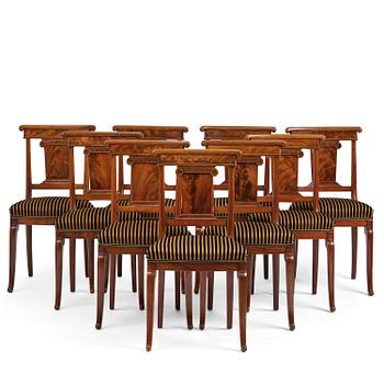 77. A set of nine Charles X mahogny dining chairs.