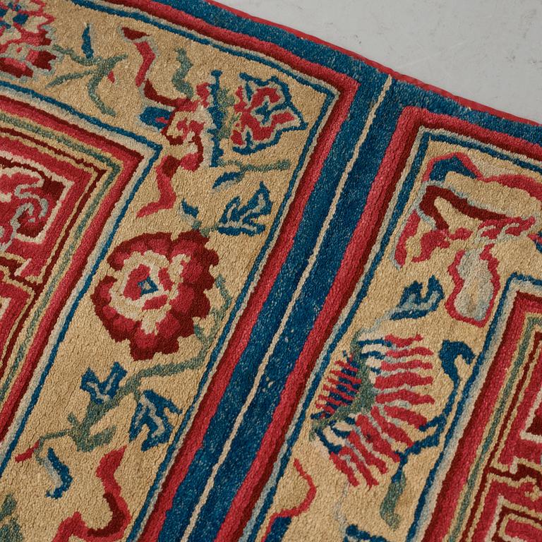 A MEDITATION RUG, an antique/a semi-antique Tibetan, ca 150,5 x 81 cm (as well as 10 cm flat weave at the ends).