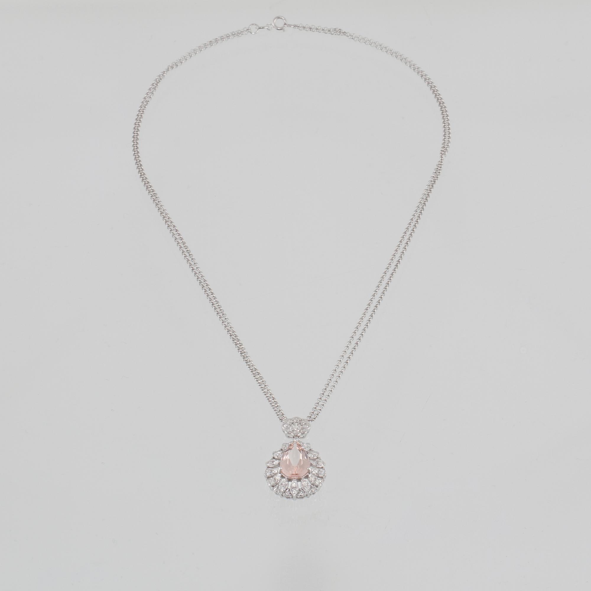 HÄNGE, 18K vitguld med droppslipad morganit 2.54 ct samt briljantsliapde diamanter 1.16 ct. Vikt 7,1 gram.