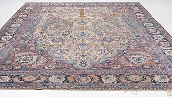 An antique/semi-antique Kerman carpet c 415 x 305 cm.