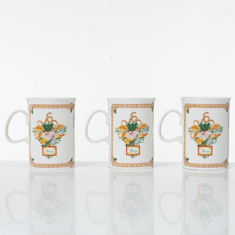 Gucci, A set of six vintage christmas mugs.
