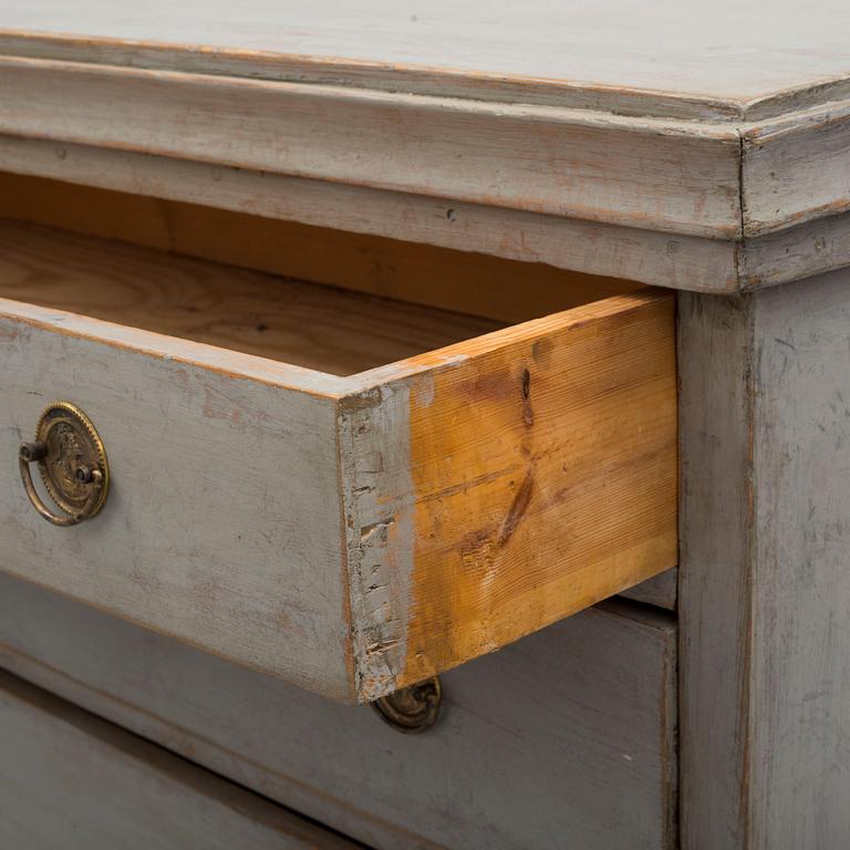 A mid 19th century painted chest of drawers.