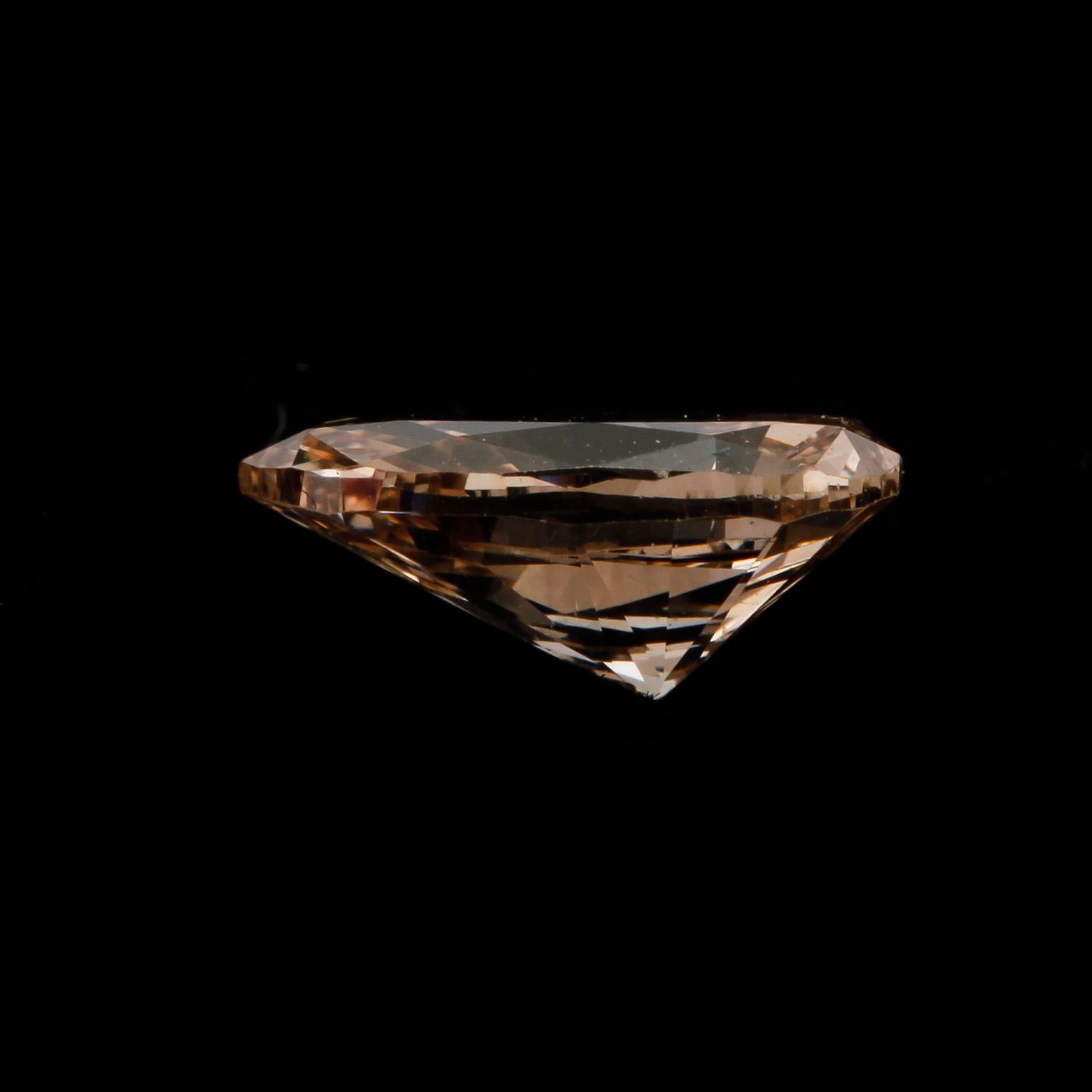 DIAMANT, oinfattad, champagnefärgad, ca 0,77ct.