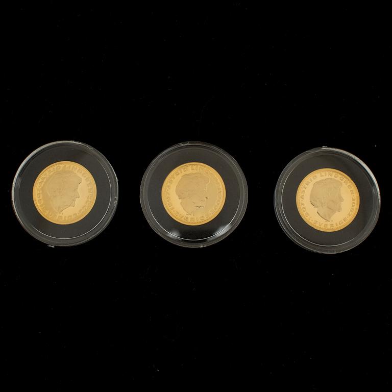 MYNT, 3 st, guld, Myntverket Moneta, minnespräglingar, utgivna 2004. Vikt 8,6 g.