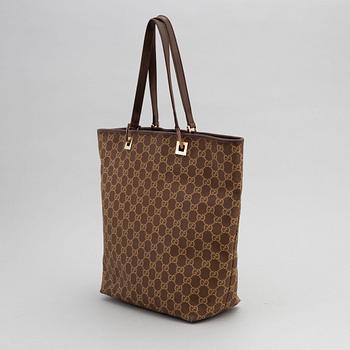 Gucci, a monogram canvas handbag.
