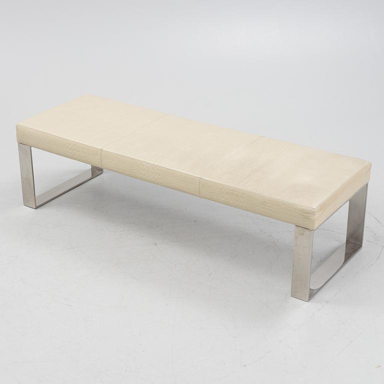 A contemporary leather upholstered bench,