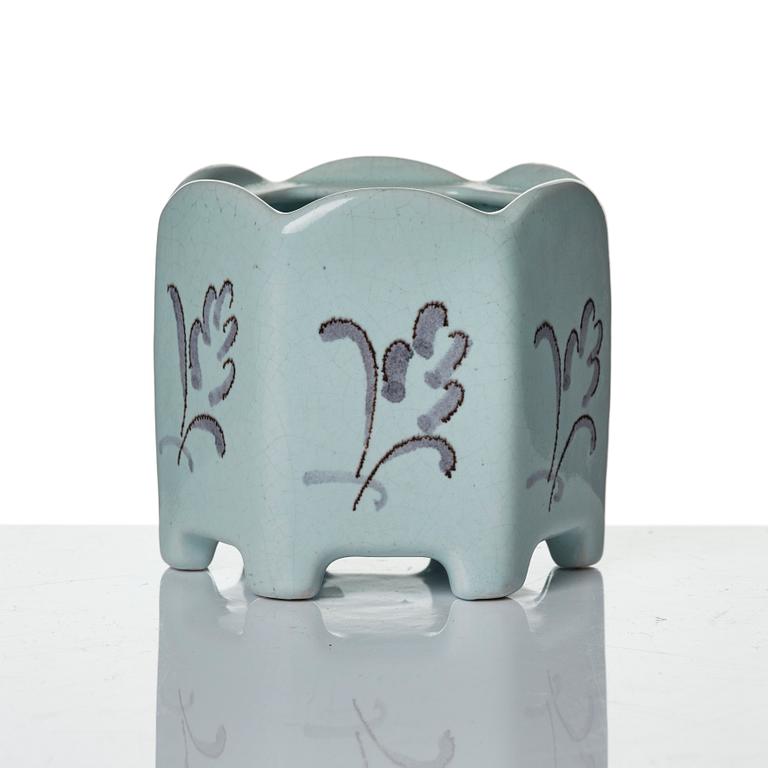 Wilhelm Kåge, eleven pieces of faience including jars, inkwells and a tulip vase, Gustavsberg, Sweden, 1919-1920.
