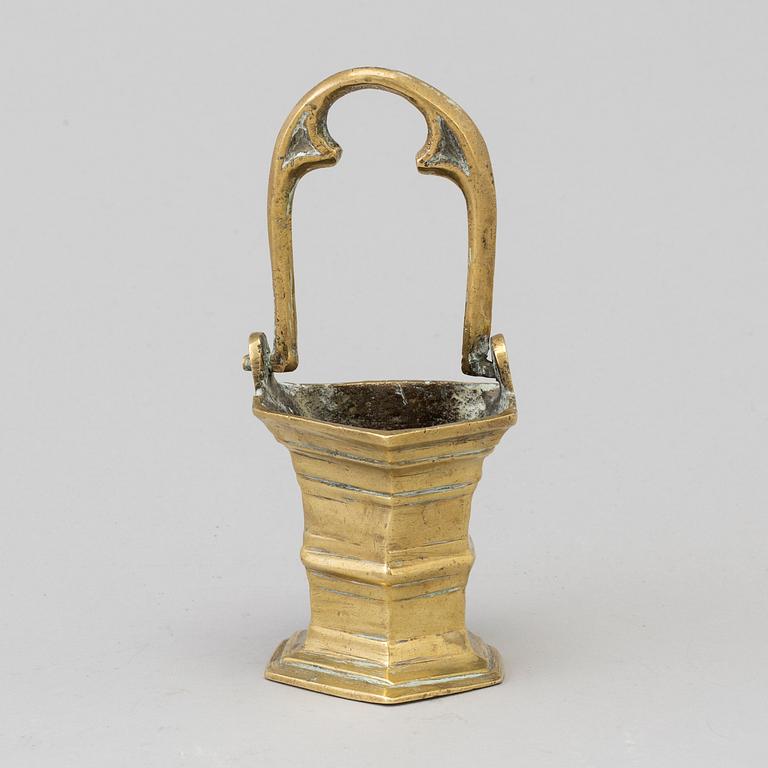 A 18th century bronze holy water bowl.