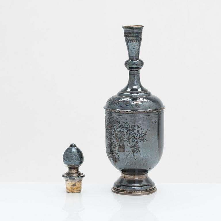 An 8-piece silver vodka set, Moscow 1882-1899. Cyrillic maker's mark G.B.