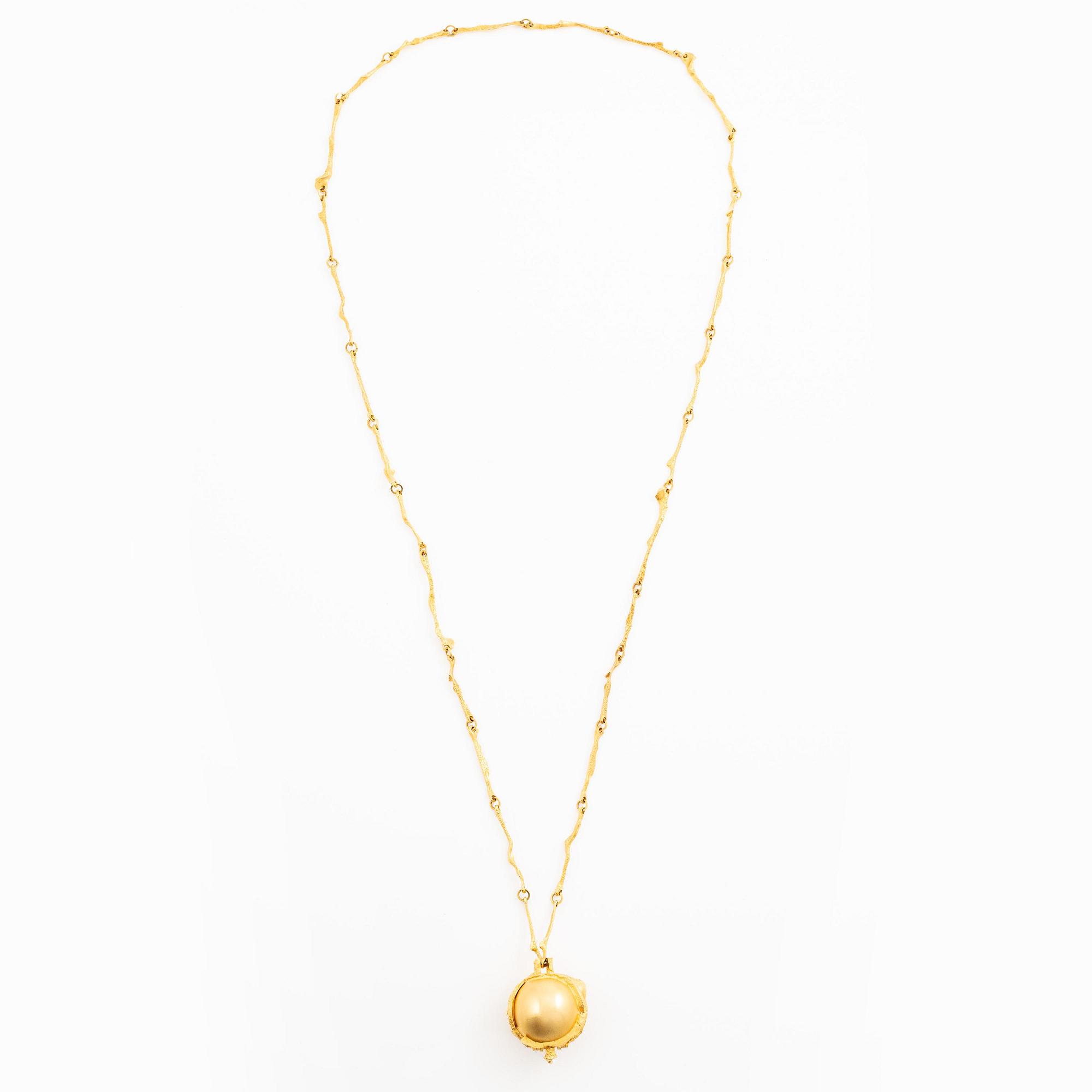 Björn Weckström, collier med klocka "Sun Dial", 18K guld, Finland 1974. För Lapponia.