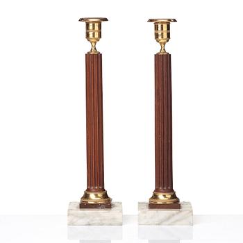 A pair of late Gustavian late 18th century candlesticks.