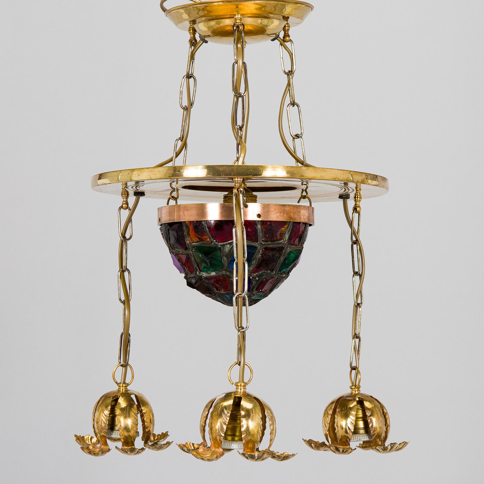 Kattovalaisin, 1900-luvun alku.