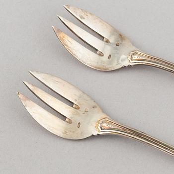 A set of 12 silver oyster forks, mark of Delheid Frères, Belgium, circa 1900.