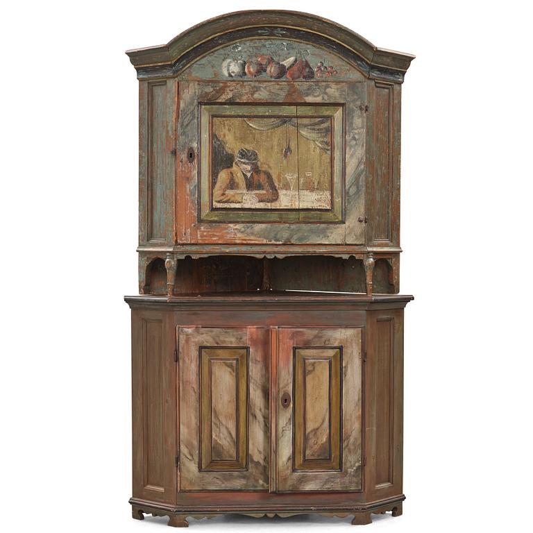 A Swedish polychrome-painted corner cabinet attributed to J. Bäckström (1773-1837).