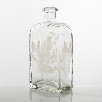 A set of three glass bottles and one decanter, 19th Century.