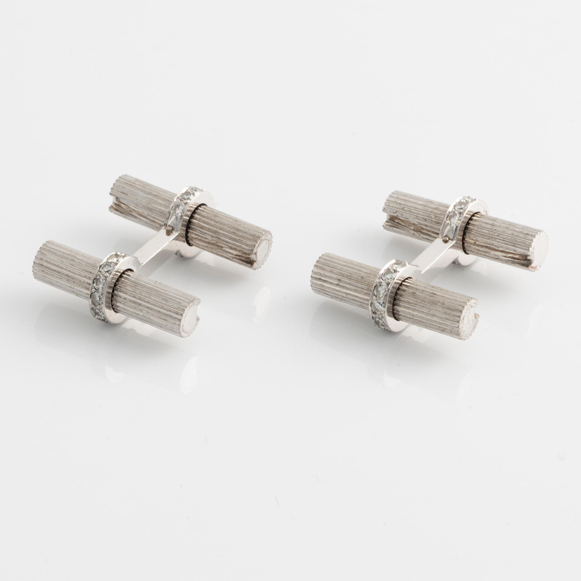 A pair of cufflinks in 18K white gold with eight-cut diamonds.
