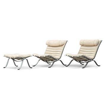 29. Arne Norell, "Ari", a pair of white leather easy chairs and one ottoman for Norell Möbel AB, Sweden.