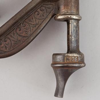 Two wine bottle openers, one Eskilstuna, circa 1900.