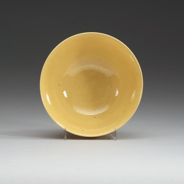 A Chinese yellow glazed bowl, with Kangxi six character mark.
