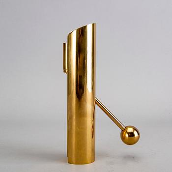 A Pierre Forssell brass candle stick for Skultuna.