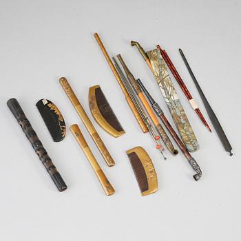 A group of Japanese pins, combs, paper opners and pipes, Meiji period (1868-1912).