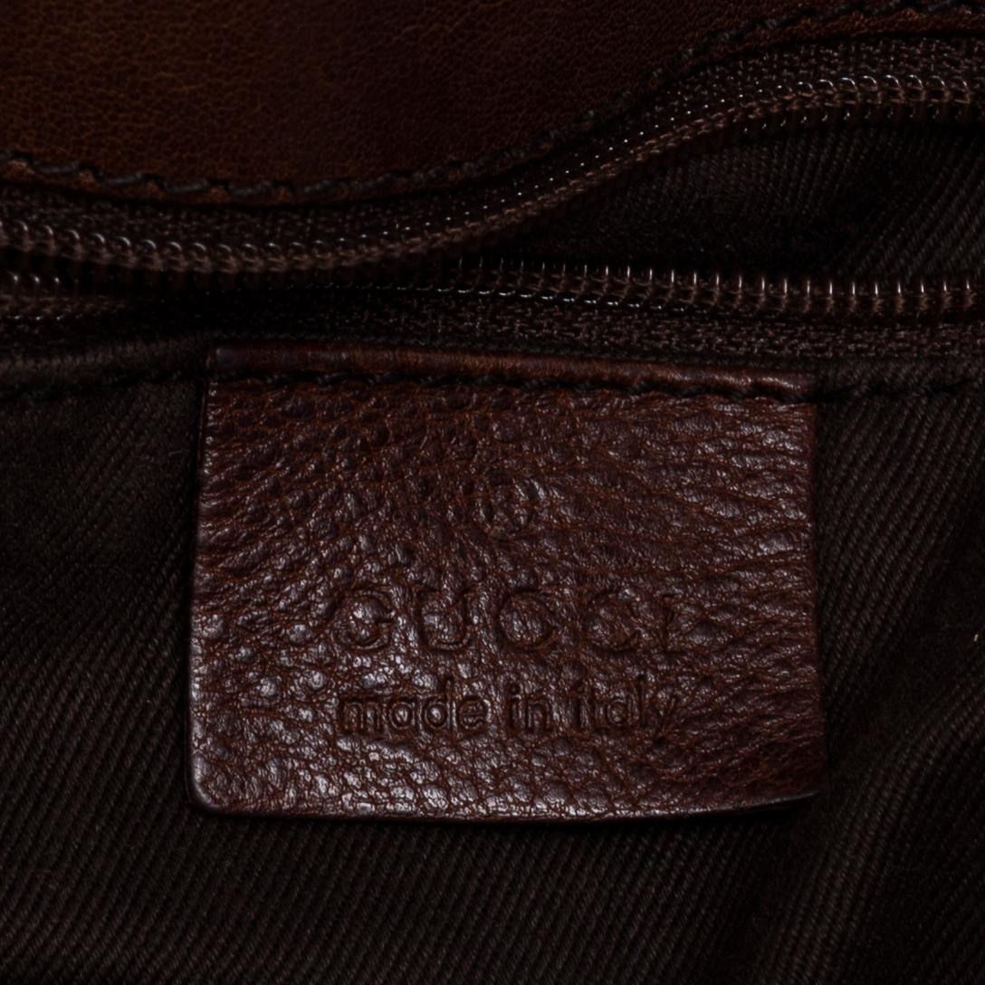 GUCCI, A canvas and leather bag.