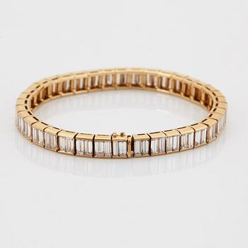 Van Cleef et Arpels armband 18K guld med baguetteslipade diamanter "Bracelet Baguette".