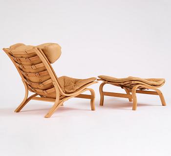 Arne Norell, a 'Scandi', easy chair and ottoman, Norell Möbel AB, Sweden 1970s.