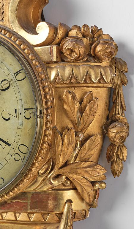 A Gustavian giltwood cartel clock by L. Adamson Wester (watchmaker in Stockholm 1780-95).