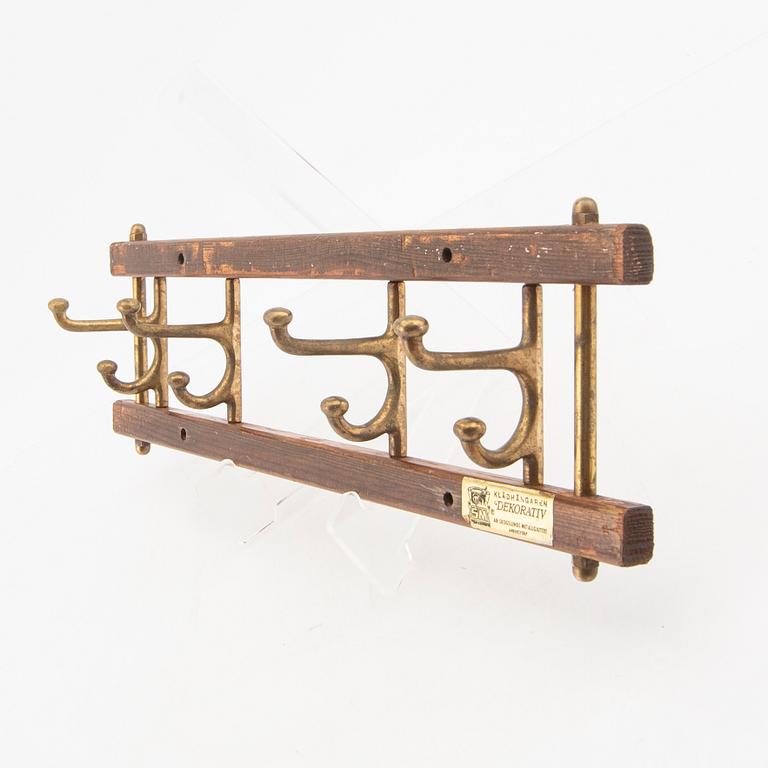 Clothes hangers, a pair, "Decorative", Skoglund metal foundry, Anderstorp, mid 20th century.
