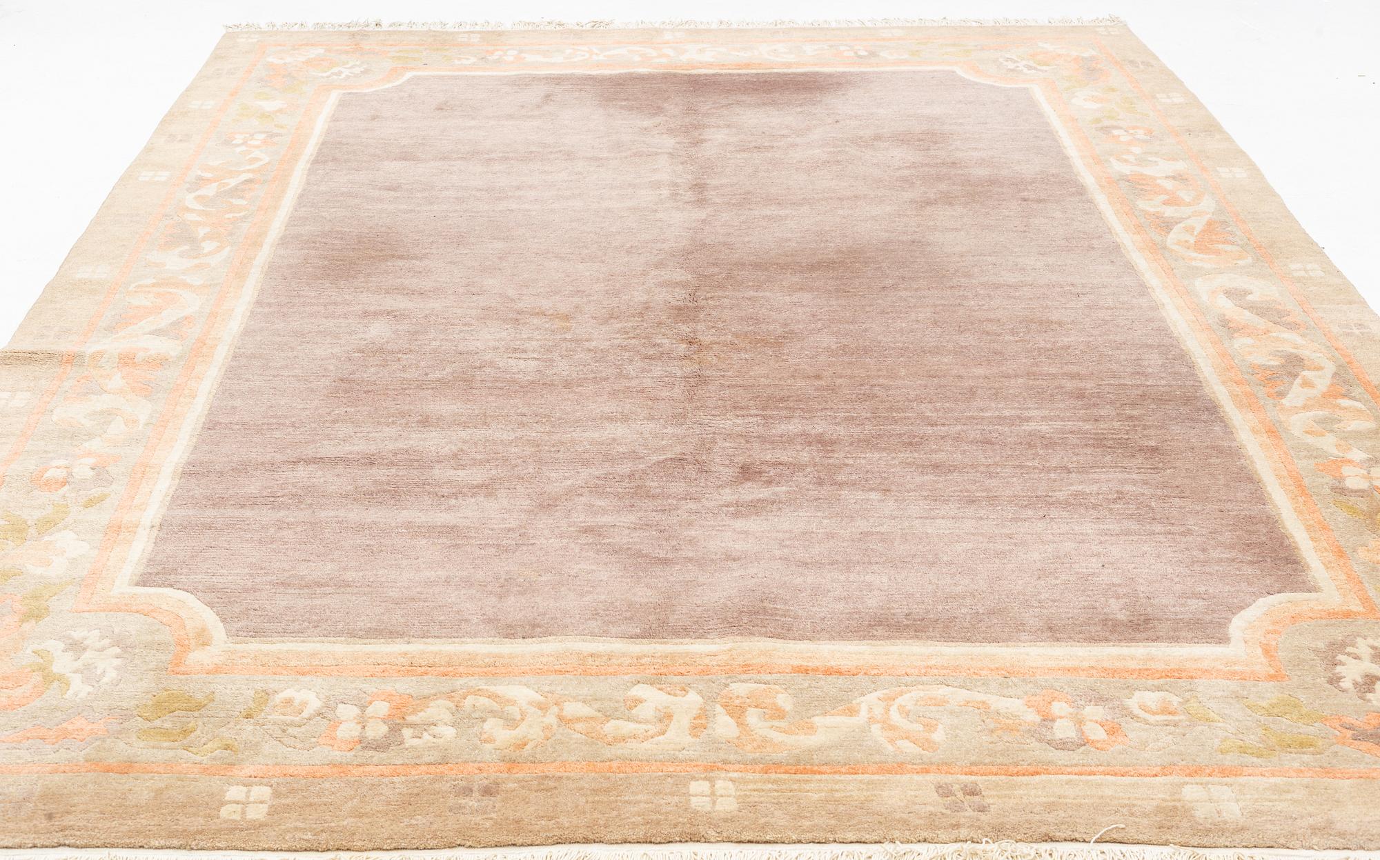 A carpet, Tibet, c. 245 x 357 cm.
