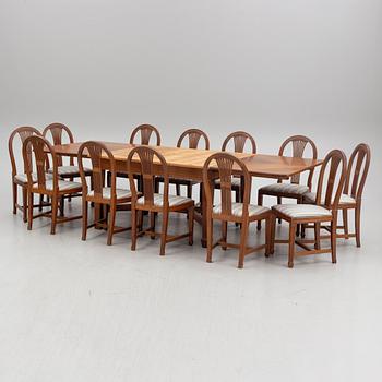 A Dining table and 12 chairs, Jugend, early 20th century.