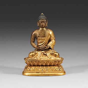 215. A Sino-Tibetan part-gilt bronze figure of Amitabha Buddha, 18th Century.