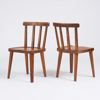 Axel Einar Hjorth, a set of six stained pine 'Utö' chairs, Nordiska Kompaniet, Sweden 1930s.