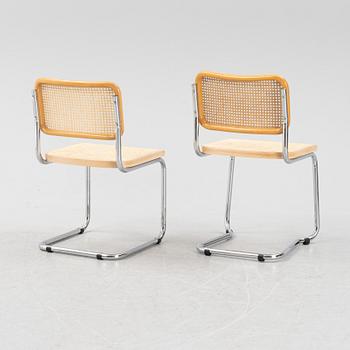 A set of five steel and rattan chairs from the late 20th century.