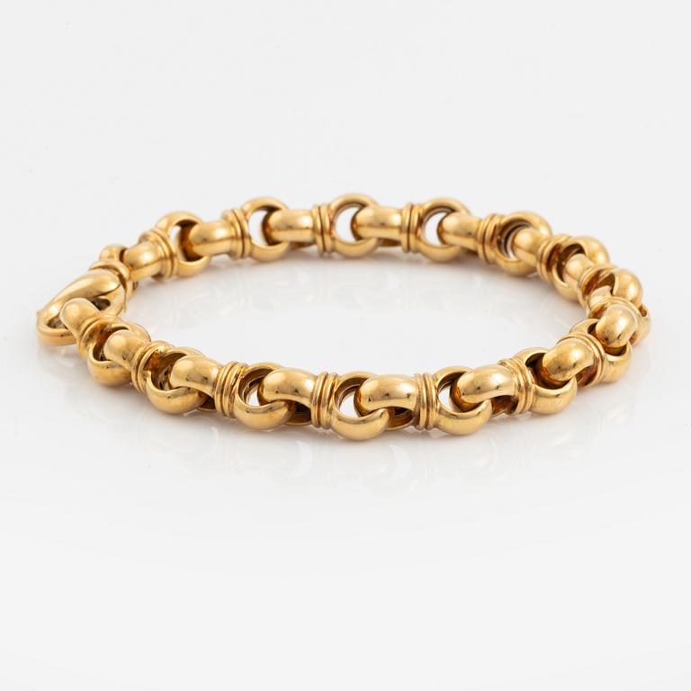 An 18K gold Tännler bracelet.