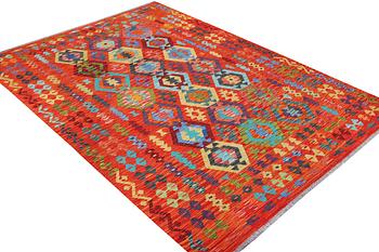 A Kilim carpet, c. 292 x 203 cm.