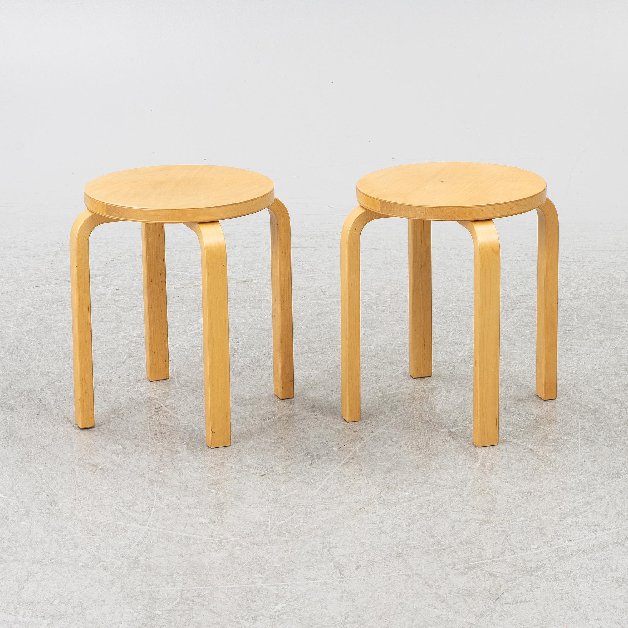 Alvar Aalto, a pair of model E60 stools, Artek, Finland.