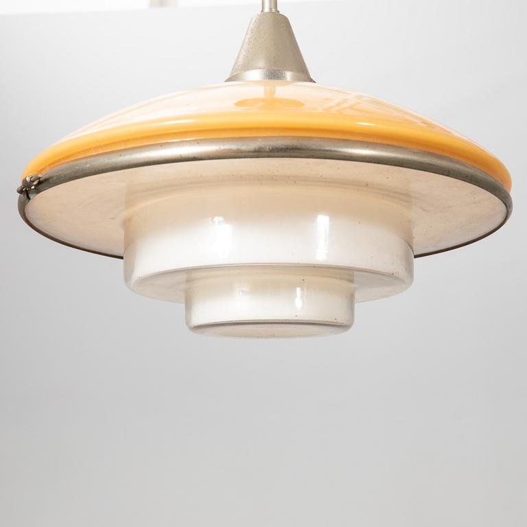 Otto Müller, Taklampa, "Sistrah-pendel", Megaphos, 1900-talets första hälft.