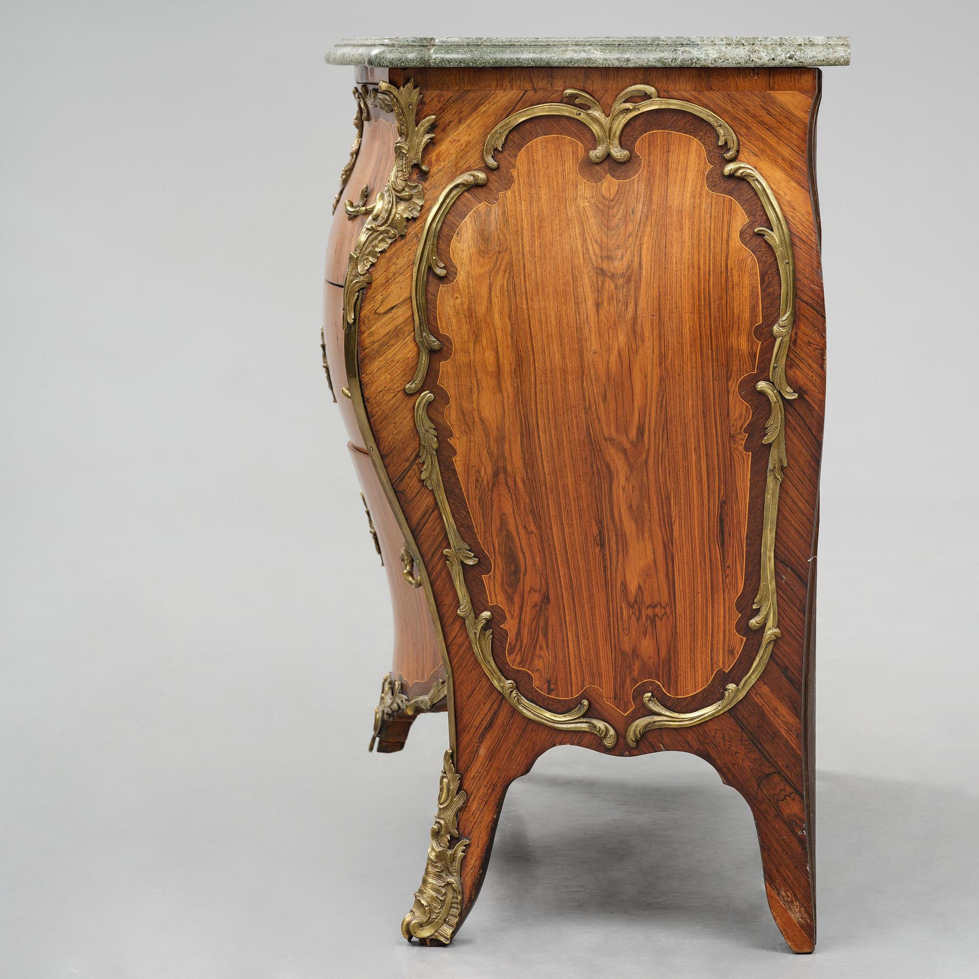 A rococo parquetry and gilt brass-mounted commode by L. Nordin (master in Stockholm 1743-1773).