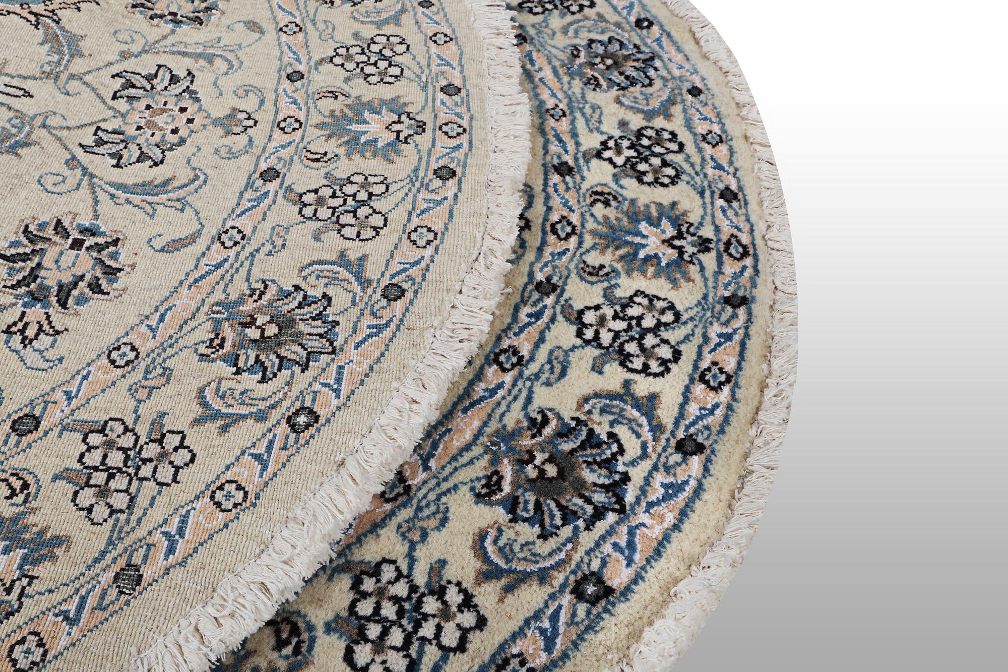 A rug, Nain, part silk, ca 136 x 136 cm.