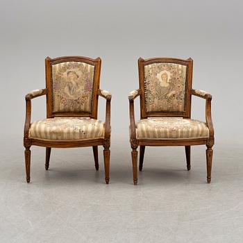 A pair of 18th/19th century armchairs.