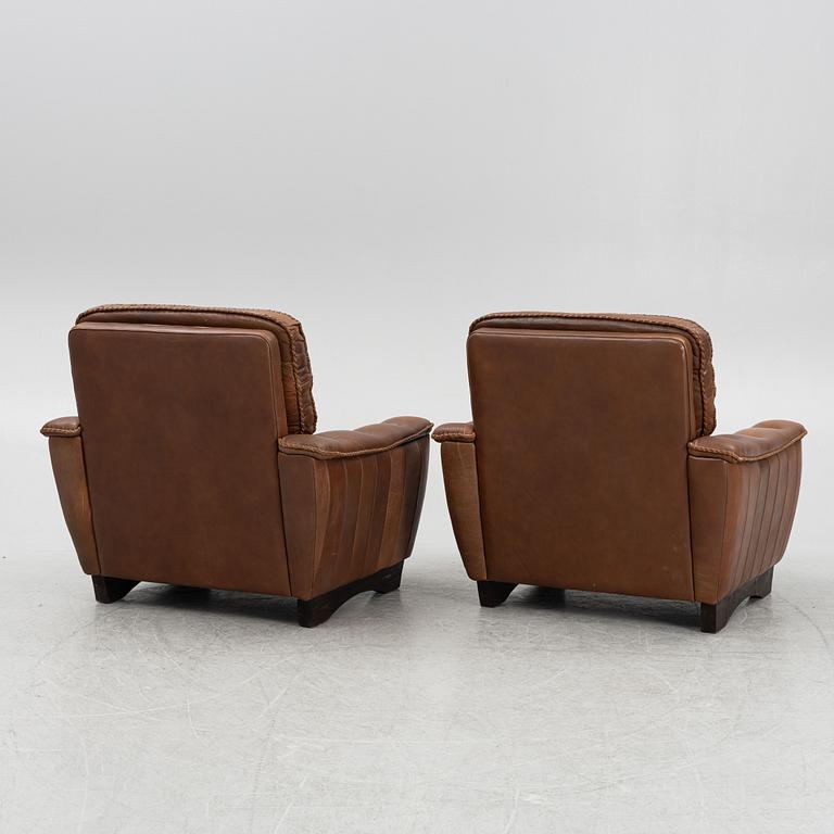 A Pair of Leather Armchairs, second half of the 20th Century.
