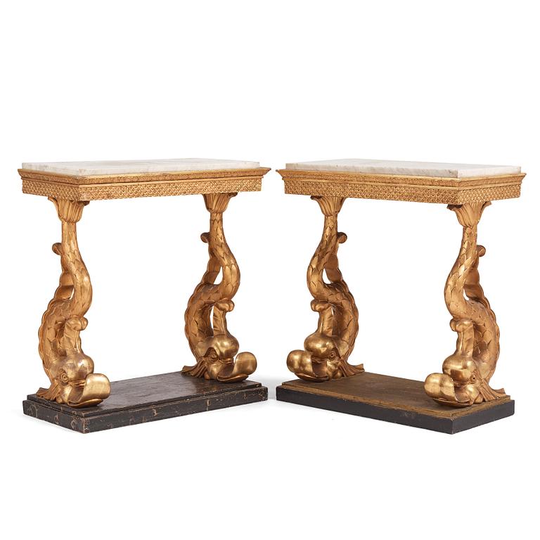 A matched pair of Swedish Empire console tables, first half of the 19th century.