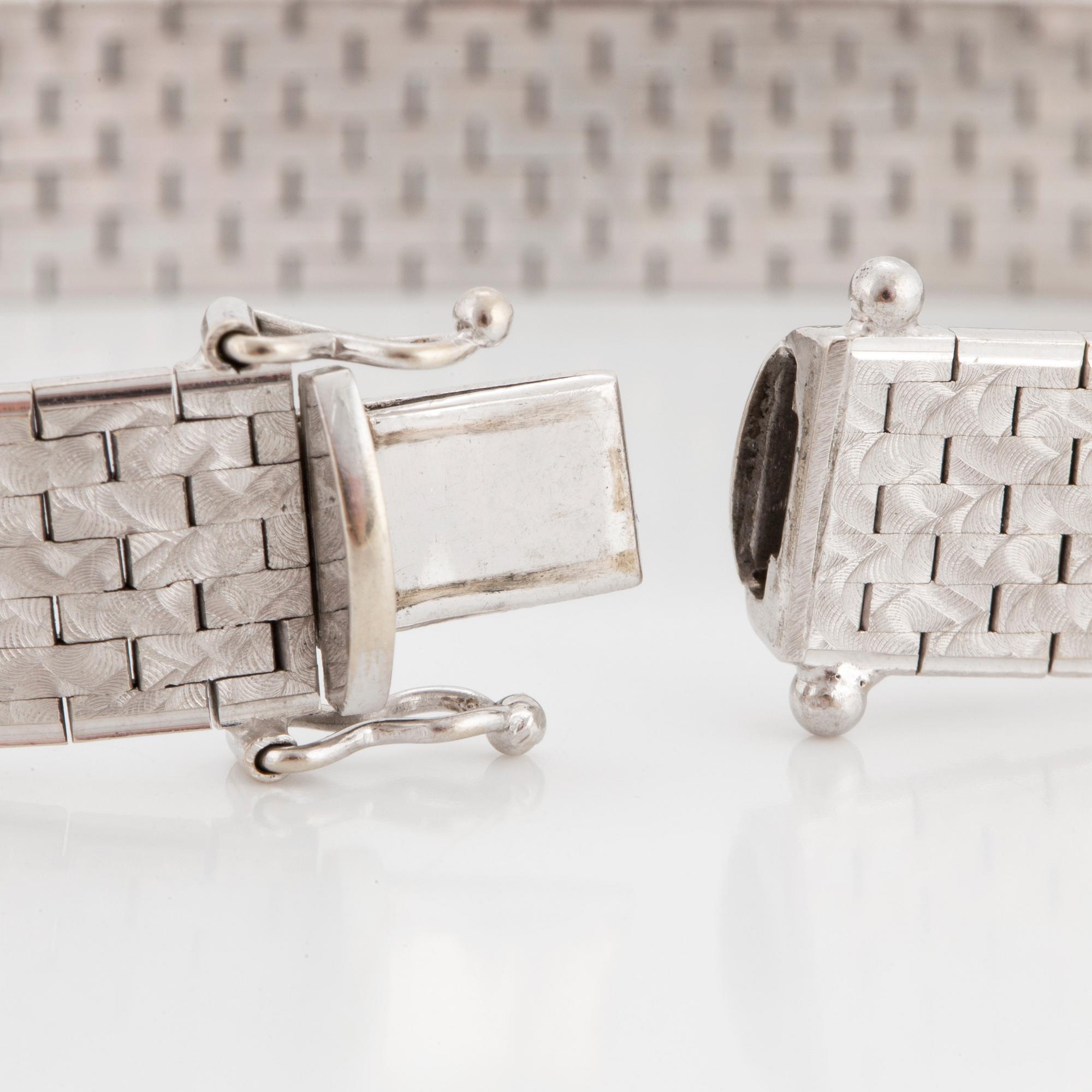 ARMBAND, 18K vitguld.