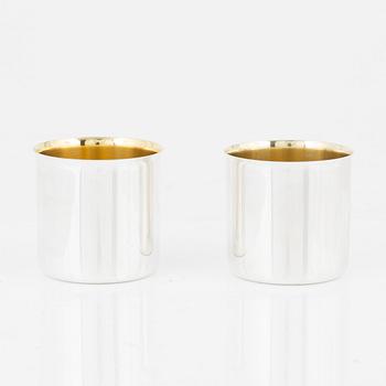 A set of eight parcel gilt Swedish silver vodka cups, bearing the mark of GAB, Stockholm, 1966-1970.